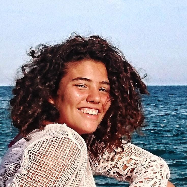 Portrait of Nova, group coordinator and fusion cooking expert